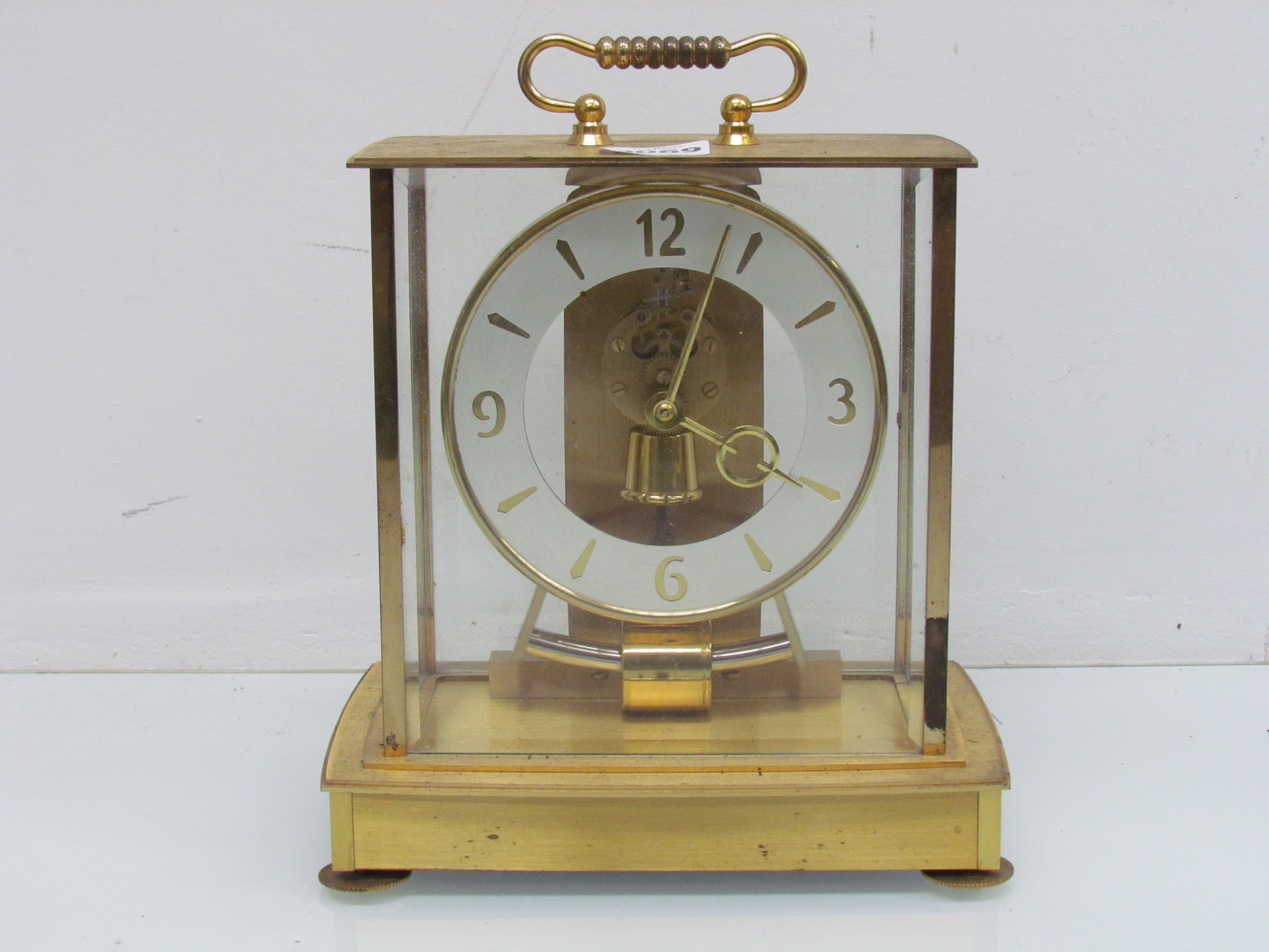 A mid 20th Century Kundo Electronic four glass mantel clock,