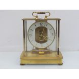 A mid 20th Century Kundo Electronic four glass mantel clock,