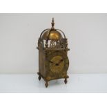 A 20th Century lantern timepiece, housing a French carriage single train patfrom movement, with key,