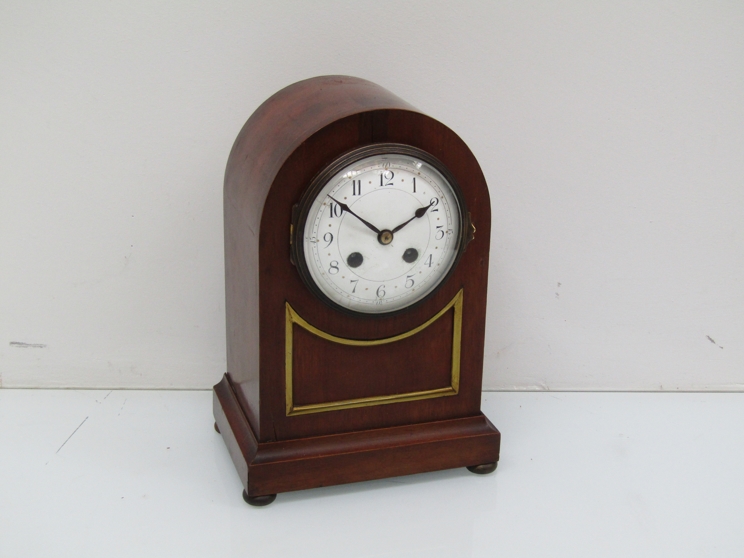 A late 19th Century mahogany dome top mantel clock with Arabic enamelled dial,