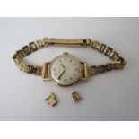 LONGINES: a 9ct gold lady's bracelet watch