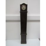 A 1930's oak granddaughter clock with Arabic silvered dial, spring driven 30 hour movement,