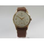LONGINES: a 1950's 9ct gold cased gent's wristwatch with manual wind movement,