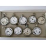 Nine base metal open faced pocket watches,