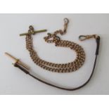 A 9ct gold guard chain with leather strap,