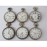 Six early 20th Century silver keyless wind open faced pocket watches,