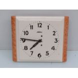 An Art Deco ceramic wall clock,