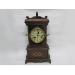 An early 20th Century table clock in scratch built case,