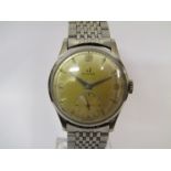 OMEGA: A stainless steel cased gent's wristwatch with Omega steel bracelet and clasp,
