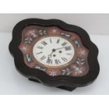 A late 19th/ early 20th Century French ebonised dial clock of shaped form,