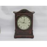 A 19th Century English flame mahogany bracket clock with painted metal Roman dial signed Jn.