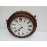 An early 20th Century walnut cased Gent's of Leicester Pul-Syn-Etic double sided dial clock with