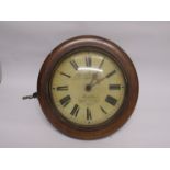 A Victorian postman's alarm clock, painted wooden Roman dial signed Winterhalder, High Street,