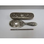 A Chinese silver dressing mirror frame, comb frame and brush,