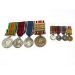 A George V and later constabulary medal group of four consisting of WWII Defence medal named to