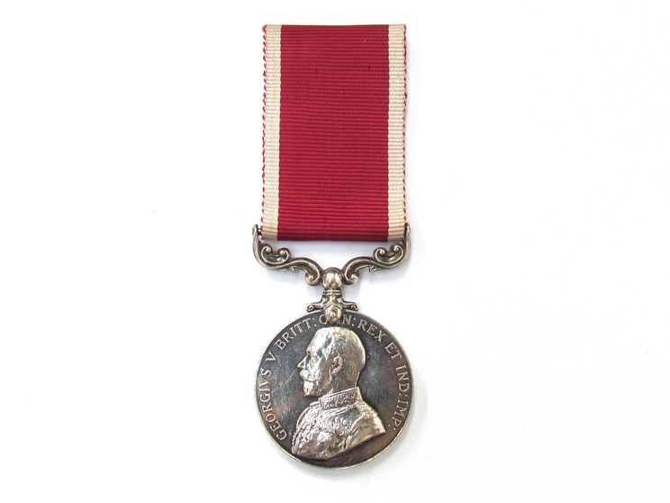A George V Army Long Service and Good Conduct Medal with scrolled fixed suspender named to 1852193