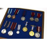 A collection of coronation and jubilee medals spanning from Queen Victoria 1897 until Queen