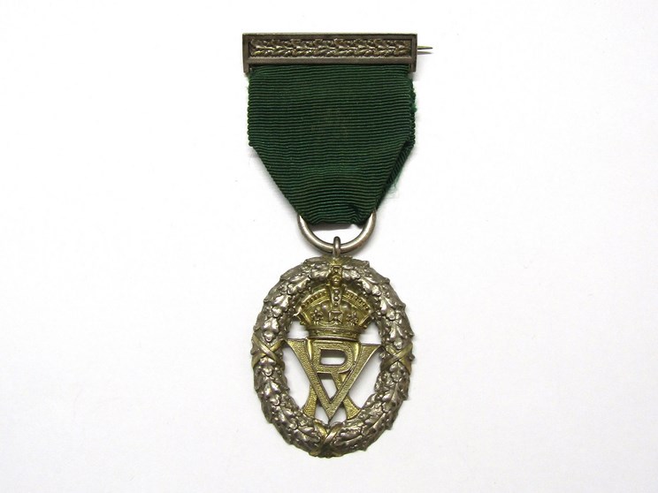 A Victorian Volunteer Officer's Decoration, central VR under a crown,