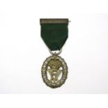 A Victorian Volunteer Officer's Decoration, central VR under a crown,