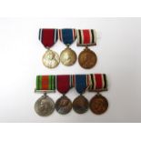 Two Special Constabulary Long Service Medal groups: A medal group of four consisting of WWII