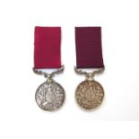 Two Army Long Service and Good Conduct Medals (2nd Type) with scrolled swivel suspenders.
