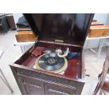 A mahogany cased Fullotone gramophone cabinet with carved frieze