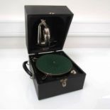 A Decca portable record player retailed by Willmotts,