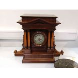 A Polyphon 'Ducal' coin operated mantel clock playing 11" discs,