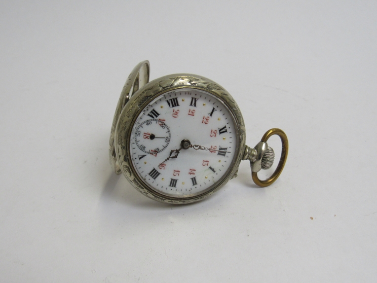 Marked Argentan a ladies fob watch with unusal dial decorative Art Nouveau case,