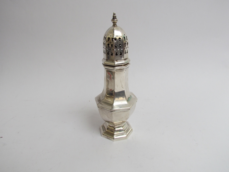 A Harrison Brothers and Howson Ltd silver sugar caster with finial top, faceted body,