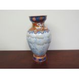 An early 20th Century Japanese Imari vase with blossom and bird decoration to body (foot chipped,