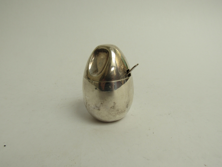 A Georg Jensen Sterling silver mustard pot of egg shape form, lined interior, 7.