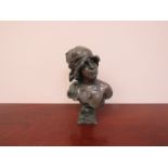 A resin figural bust of Arts & Crafts female,