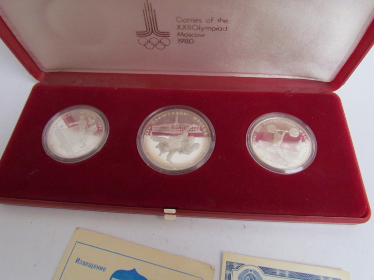 A cased set of three Russian Olympic tokens from the 1980 Mosco Olympiad (3) - Image 2 of 2