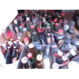 A large quantity of miniatures including liquers and Guinness