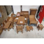 A quantity of oak dolls furniture