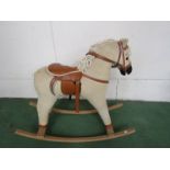 A rocking horse on bowed rocker,