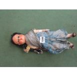 A composition and cloth costume doll