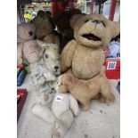 A quantity of mostly vintage care worn soft toys