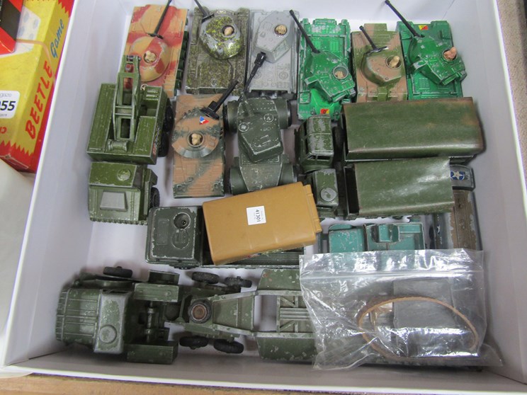 A box of fifteen military diecast vehicles including tank carrier