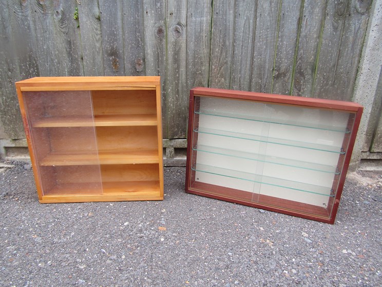 Two collectors display cabinets