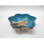 An enamelled metal bowl with bright abstract decoration, indistinct signed to base. 5.5cm high x 19.