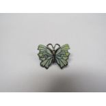 A 1980's white metal butterfly brooch, possibly by Norman Grant,