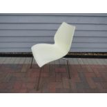 A Maui chair designed by Vico Magistretti made by Kartell