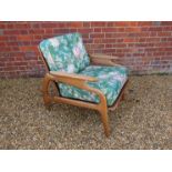 A 1940's Italian teak framed armchair,