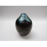 NORMAN STUART CLARKE (b.1944): An iridescent art glass vase of ovoid form.