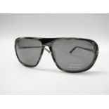 Calvin Klein, a pair of original designer sunglasses,