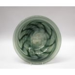 ANTHONY STERN (b.1944): A studio glass charger in green with mottled detail.