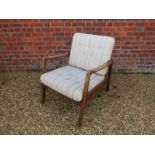 A 1940's Danish oak framed armchair with original oatmeal seat and back cushion pads