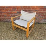 A Danish beech framed safari style chair with canvas seat and back rest